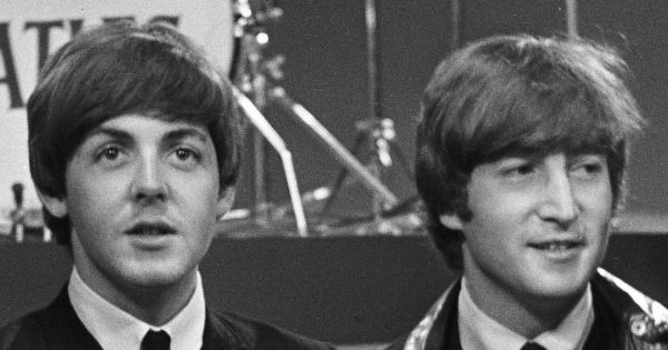 Image in QuizMyDay Beatles Song & Album Trivia: Can You Match the Song to the Right Album? trivia quiz featuring The Beatles during television recordings in Hillegom. John Lennon-Paul McCartney (1964)