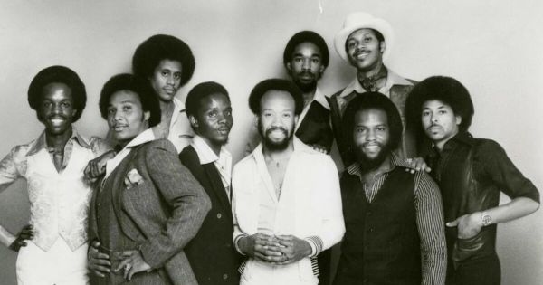 Image in QuizMyDay September Sparks: The Ultimate Earth Wind & Fire Quiz trivia quiz featuring Earth, Wind, and Fire in a press photo dated to 1977. Photo itself was taken the same year or earlier