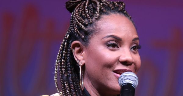 Image in QuizMyDay MC Lyte Music Quiz: Test Your Hip-Hop Knowledge trivia quiz featuring <a href="https://en.wikipedia.org/wiki/MC_Lyte" class="extiw" title="w:MC Lyte">MC Lyte</a> speaking at an event in Phoenix, Arizona.