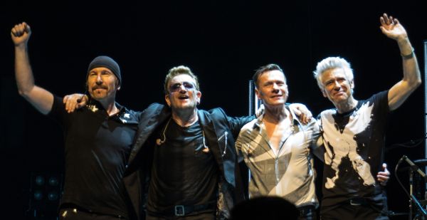 Members of U2 take a curtain call after a performance in Glasgow on November 7, 2015