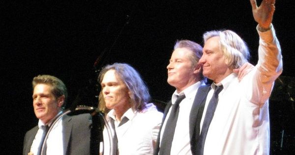 Image in QuizMyDay Eagles Hell Freezes Over Tour Trivia Quiz trivia quiz featuring The Eagles. Left to right: Glenn Frey, Timothy B. Schmit, Don Henley and Joe Walsh