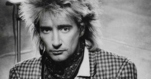 Image in QuizMyDay Rod Stewart Ultimate Quiz: Hits, Life & Legacy trivia quiz featuring Rod Stewart in a 1984 publicity photo.