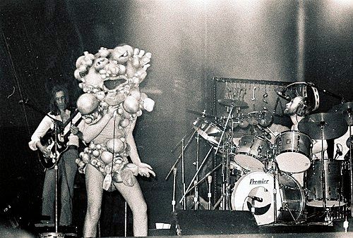 Genesis performing live at the Auditorium Theatre on 20 November 1974.