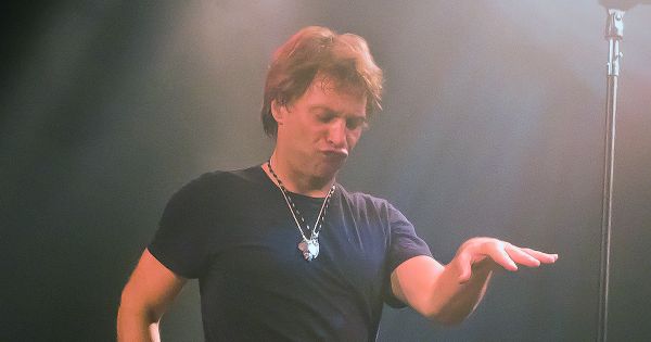 Image in QuizMyDay Livin’ on a Quiz: The Ultimate Bon Jovi Challenge trivia quiz featuring Jon Bon Jovi doing his Mick Jagger imitation at House of Blues in Orlando, Florida on Oct 17, 2011. This was a private party sponsored by Versata of Austin, TX as part of the Gartner Symposium conference.