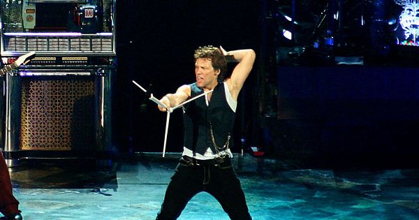 An image in QuizMyDay Bon Jovi trivia quiz featuring Bon Jovi performing on stage in 2007