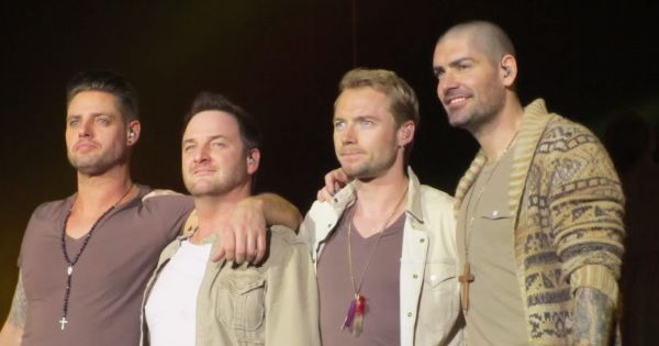 Image in QuizMyDay Boyzone Trivia Quiz: Test Your Ultimate Fan Knowledge trivia quiz featuring Boyzone on tour in 2011.