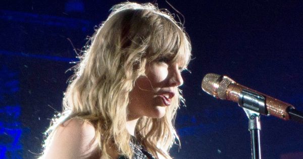 Image in QuizMyDay Taylor Swift Reputation Album Quiz: How Well Do You Remember It? trivia quiz featuring Swift performing on her Reputation Stadium Tour in May 2018