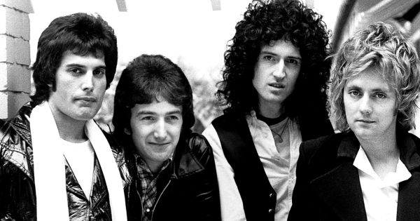 Image in QuizMyDay Match the Decade to the Rock Hits Quiz: Test Your Music Timeline Skills trivia quiz featuring Musical band Queen, circa 1977. From left to right; Freddie Mercury, John Deacon, Brian May and Roger Taylor