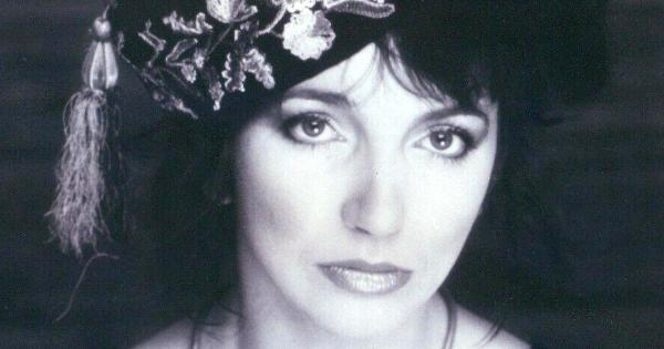 Image in QuizMyDay Kate Bush trivia covering songs, albums, lyrics, and her unique musical legacy. trivia quiz featuring Kate Bush in a publicity photo for her album <i>Hounds of Love</i>, circa 1985.