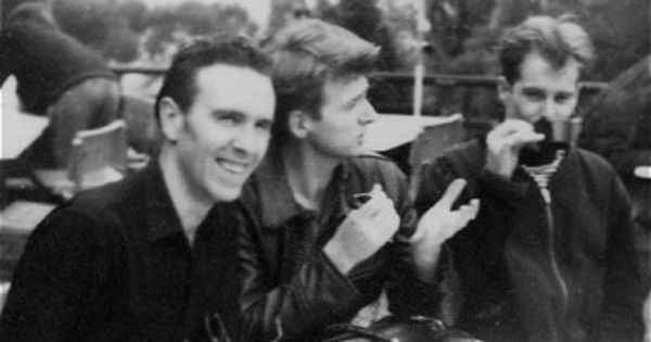 Image in QuizMyDay Crowded House Quiz: Test Your Music Expertise trivia quiz featuring Crowded House at the Montreux Pop Festival, Montreux, Switzerland. L to R: Nick Seymour, Neil Finn, Paul Hester