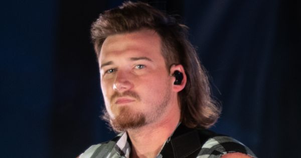 Image in QuizMyDay Country Billboard #1 Hits Quiz: Test Your Chart-Topper Facts trivia quiz featuring Morgan Wallen, an American country music artist performs his hit single “Whiskey Glasses” during Freedom Fest, June 28, 2019, at the Iron Horse Park, Fort Carson, Colorado.