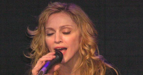 Image in QuizMyDay Madonna Relationships Quiz: How Much Do You Know About Her Love Life? trivia quiz featuring Madonna concert in Fresno