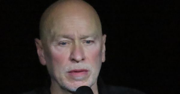 Image in QuizMyDay Psychedelic Synths & Sharp Suits: The The Quiz trivia quiz featuring <p>With his first album for 25 years released on the day of this gig, Matt Johnson toured the new songs with the current incarnation of The The. Five guys dressed in black with black stage drapes in the black hole that is Nottingham Rock City did not make for great photography. The set was unconventional - the first half being the entire album that none of us had heard, followed by a second set of "greatest hits" including Infected, Armageddon Days Are Here Again, Uncertain Smile, Heartland, This Is the Day and  Sweet Bird of Truth.
</p><p>Sadly the front of house sound was so appalling that I have no idea what the new material is about or even if its any good - it was one loud distorted bass-heavy  mess. A disappointing comeback for an innovative &amp; interesting artist.
</p><p>Matt Johnson – vocals, guitars
Barrie Cadogan – lead guitar
DC Collard – keyboards, melodica
</p>
James Eller – bass guitar