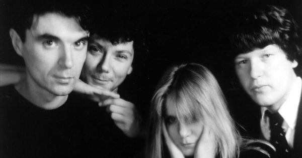 Image in QuizMyDay Talking Heads Quiz: Ultimate New Wave Challenge trivia quiz featuring Musical group Talking Heads; left to right: <a href="https://en.wikipedia.org/wiki/David_Byrne" class="extiw" title="w:David Byrne">David Byrne</a>, <a href="https://en.wikipedia.org/wiki/Jerry_Harrison" class="extiw" title="w:Jerry Harrison">Jerry Harrison</a>, <a href="https://en.wikipedia.org/wiki/Tina_Weymouth" class="extiw" title="w:Tina Weymouth">Tina Weymouth</a>, <a href="https://en.wikipedia.org/wiki/Chris_Frantz" class="extiw" title="w:Chris Frantz">Chris Frantz</a>, in a promotional photo for the album <i>Remain In Light</i>.