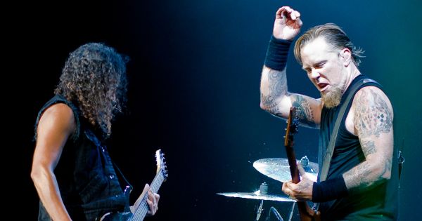 Image in QuizMyDay Metallica's "Master of Puppets" Trivia Quiz trivia quiz featuring Kirk Hammett and James Hetfield playing at Metallica show at The O2 Arena, London, England