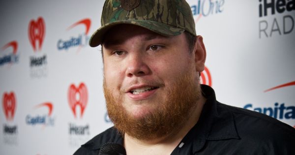 An image in QuizMyDay Luke Combs trivia quiz featuring Luke Combs being interviewed during the iHeart Country Festival in Austin, TX on May 4, 2019.