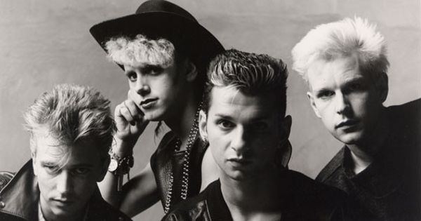Image in QuizMyDay Ultimate Depeche Mode Violator Album Quiz: Are You An Expert? trivia quiz featuring Depeche Mode, circa 1985 in a press kit promotional photo for the compilation album <i><a href="https://en.wikipedia.org/wiki/Catching_Up_with_Depeche_Mode" class="extiw" title="en:Catching Up with Depeche Mode">Catching Up with Depeche Mode</a></i>. Pictured from left to right; <a href="https://en.wikipedia.org/wiki/Alan_Wilder" class="extiw" title="en:Alan Wilder">Alan Wilder</a>, <a href="https://en.wikipedia.org/wiki/Martin_Gore" class="extiw" title="en:Martin Gore">Martin Gore</a>, <a href="https://en.wikipedia.org/wiki/Dave_Gahan" class="extiw" title="en:Dave Gahan">Dave Gahan</a>, and <a href="https://en.wikipedia.org/wiki/Andy_Fletcher_(musician)" class="extiw" title="en:Andy Fletcher (musician)">Andrew (Andy) Fletcher</a>.