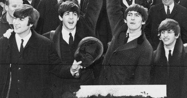 Image in QuizMyDay Name That Tune Quiz - The Beatles Edition trivia quiz featuring a Black and White Photograph of The Beatles