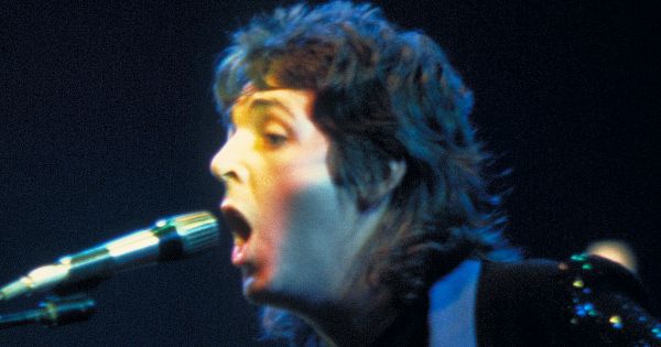 Image in QuizMyDay Paul McCartney Quiz: Songs, Albums and History trivia quiz featuring <a href="https://en.wikipedia.org/wiki/Paul_McCartney" class="extiw" title="w:Paul McCartney">Paul McCartney</a> (right) and <a href="https://en.wikipedia.org/wiki/Jimmy_McCulloch" class="extiw" title="w:Jimmy McCulloch">Jimmy McCulloch</a> during a <a href="https://en.wikipedia.org/wiki/Wings_(band)" class="extiw" title="w:Wings (band)">Wings</a> concert.