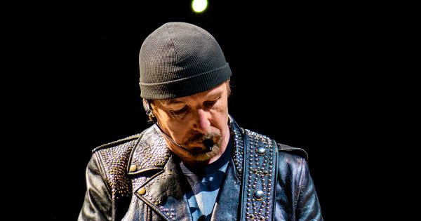 Image in QuizMyDay U2 'The Joshua Tree' Quiz: Test Your Album Facts trivia quiz featuring U2 guitarist The Edge performing at Manchester Arena in Manchester, UK  on October 20, 2018 during the band's Experience + Innocence Tour