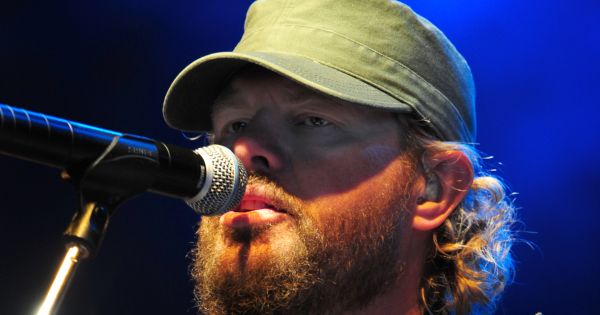 Image in QuizMyDay How Well Do You Know Toby Keith? Take The Quiz And Find Out! trivia quiz featuring Toby Keith, singer, songwriter and entertainer, performs during a concert, Ramstein Air Base, Germany, May, 1, 2010. The Toby Keith concert, sponsored by the United Services Organization and Armed Forces Entertainment was designed to entertain and help boost the morale of troops and their families.  Toby Keith will be making stops throughout Germany, Korea and the Persian Gulf during his 14-day country tour.  (U.S. Air Force photo by Staff Sgt. Jocelyn Rich)