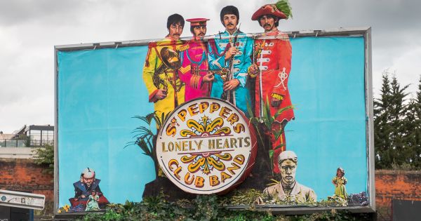 Image in QuizMyDay Beatles Trivia: How Well Do You Know the album Sgt. Pepper’s Lonely Hearts Club Band? trivia quiz featuring Sgt. Pepper's 50th Anniversary Billboard in London
