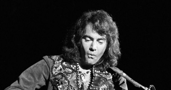 Image in QuizMyDay Neil Diamond Trivia Challenge: Ultimate Hits Quiz trivia quiz featuring Neil Diamond on stage at the Greek Theater in Los Angeles