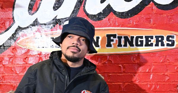 Image in QuizMyDay Chance the Rapper Ultimate Quiz: Test Your Rap Knowledge trivia quiz featuring Chance the Rapper (Chancelor Johnathan Bennett) at Raising Cane's Chicken Bicycle and Helmet Giveaway for Christmas on December 20, 2024, in North Riverside, IL 60546.