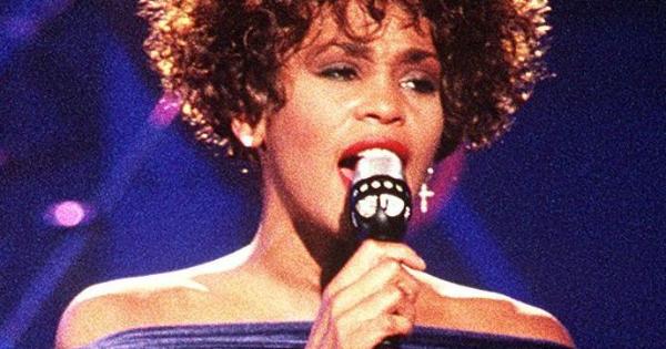 Image in QuizMyDay Whitney Houston Intro Quiz: Test Yourself trivia quiz featuring Whitney Houston performing "Greatest Love of All" during the HBO-televised concert "Welcome Home Heroes with Whitney Houston" honoring the troops, who took part in Operation Desert Storm, their families, and military and government dignitaries.