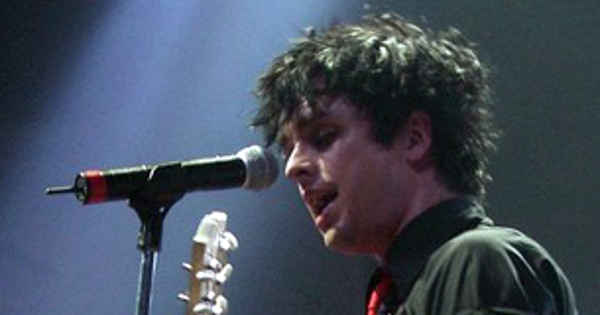 Image in QuizMyDay Green Day Albums Quiz: Test Your Punk Rock Music Trivia Skills trivia quiz featuring <a href="https://en.wikipedia.org/wiki/Billie_Joe_Armstrong" class="extiw" title="en:Billie Joe Armstrong">Billie Joe Armstrong</a>, musician, primarily of <a href="https://en.wikipedia.org/wiki/Green_Day" class="extiw" title="en:Green Day">Green Day</a>. Photograph was taken in <a href="https://en.wikipedia.org/wiki/Cardiff" class="extiw" title="en:Cardiff">Cardiff</a> during the <i><a href="https://en.wikipedia.org/wiki/American_Idiot_(album)" class="extiw" title="en:American Idiot (album)">American Idiot</a></i> tour, using a Casio QV-R40 35mm.